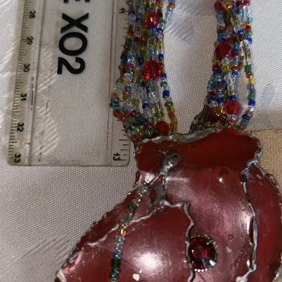 Handcrafted used multicolor Beaded Necklace w/lg. red metal hang dec. 8 strands - Picture 5 of 10